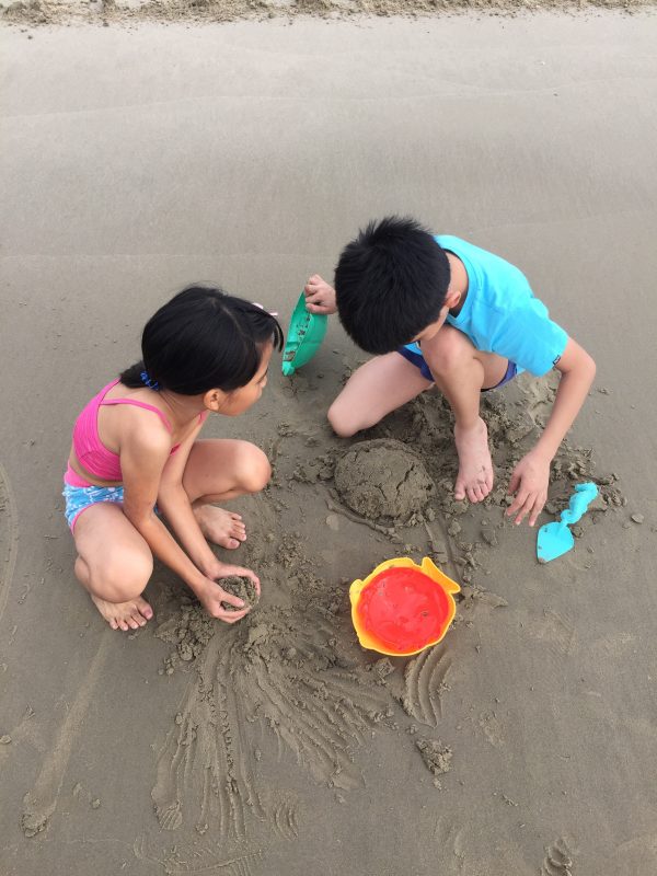 Kids playing on the beach