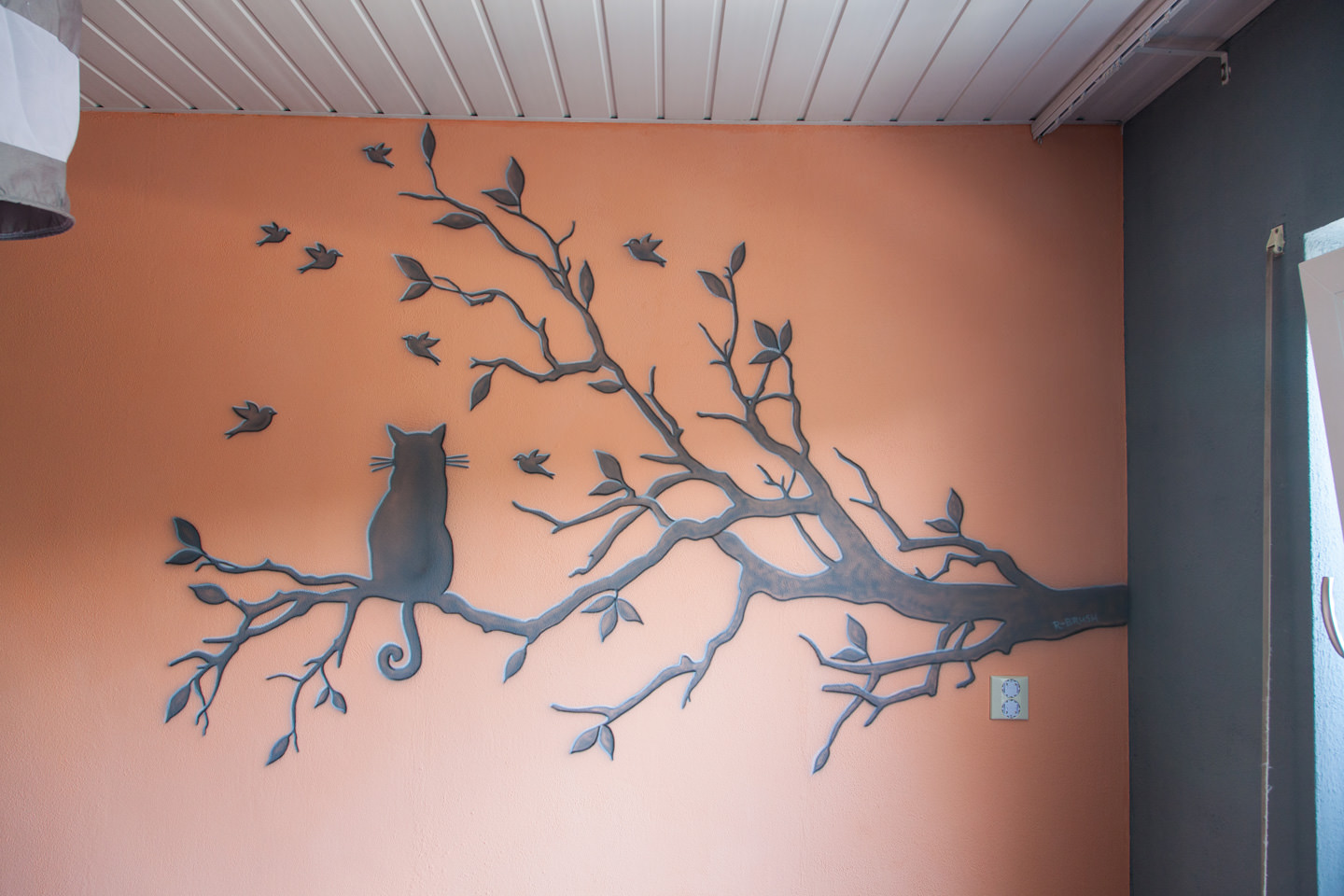 Silhouet schildering babykamer kat op tak met vogeltjes