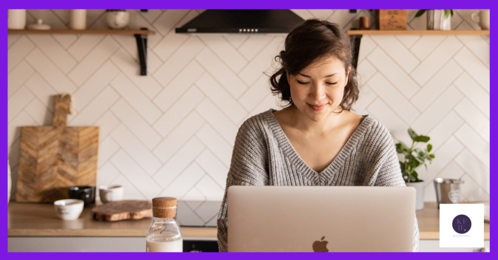 A woman at a laptop reading about fascinating blog topics