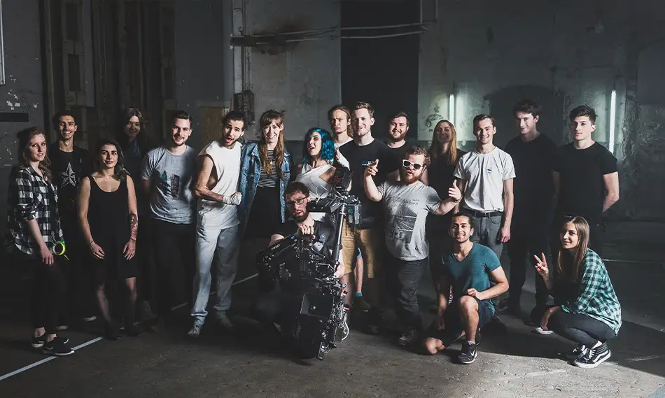 Dynamic filming moment during the music video “Come Over” – director and crew coordinating a creative scene Dynamic filming moment during the music video “Come Over” – director and crew coordinating a creative scene