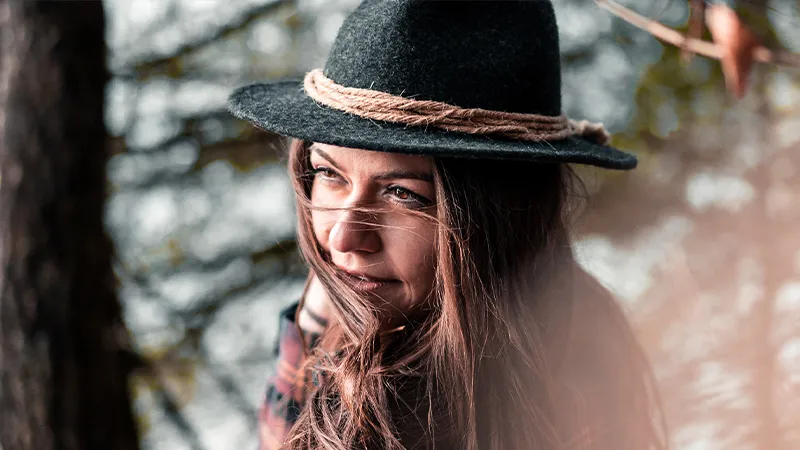 Portrait of a young woman captured in soft evening light, showing depth and natural emotion. Portrait of a young woman captured in soft evening light, showing depth and natural emotion.