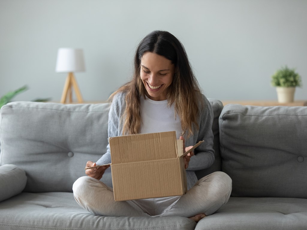 Woman opening a knitting box