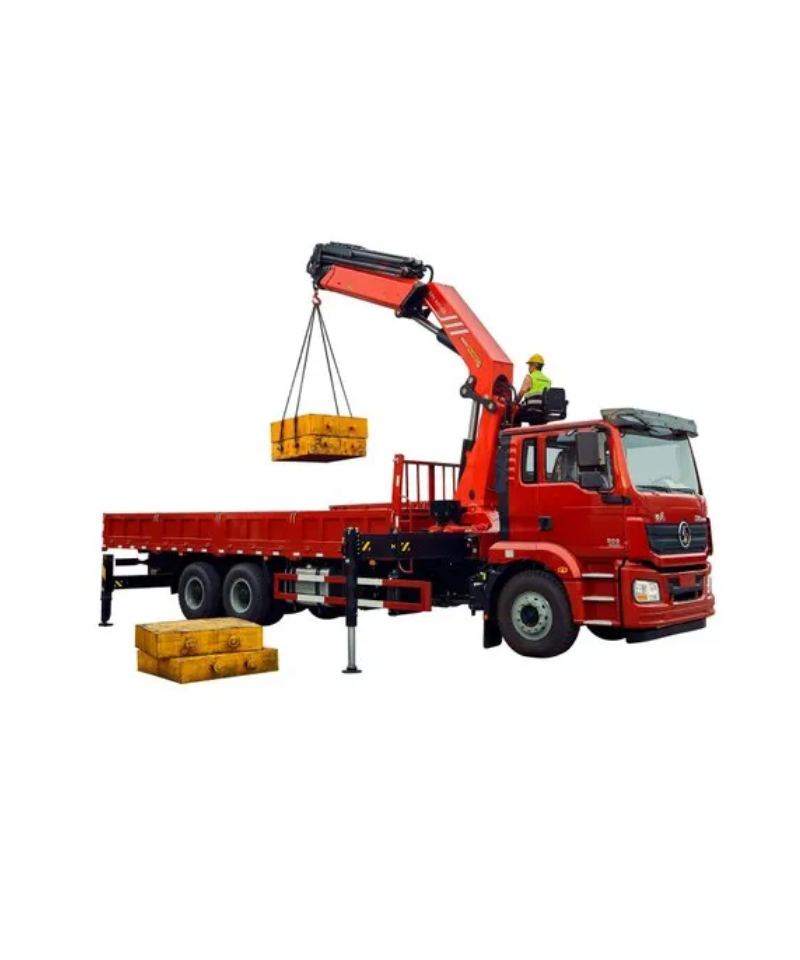 Kamion s kranom transportira građevinske materijale na visinu.