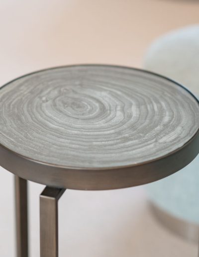 Circular end table - living room furniture designed by Koubou Interiors