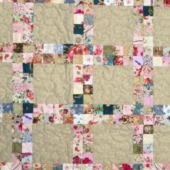 Det enkle quiltedesign tager ikke noget fra det flotte patchwork