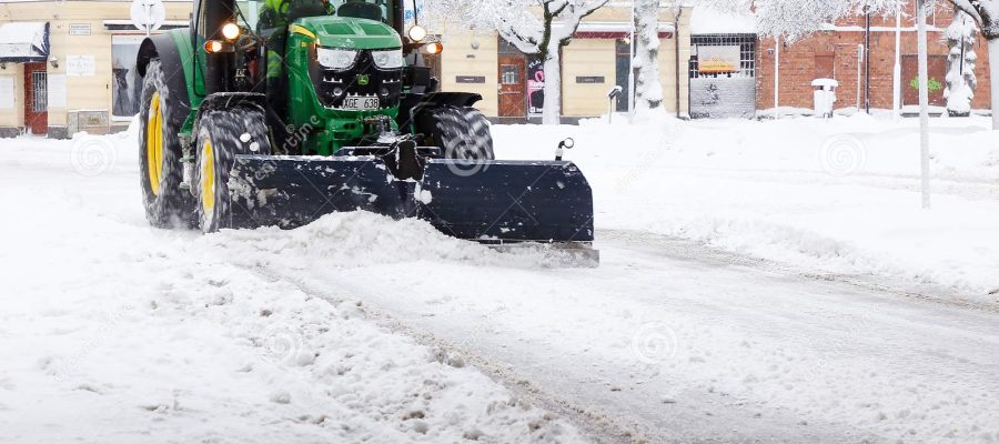 tractor-plowing-snow-sodertalje-sweden-february-green-john-deere-storgatan-street-138389910