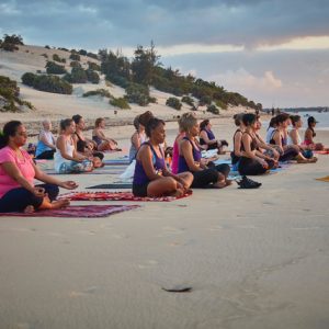 A meditation session on the beach