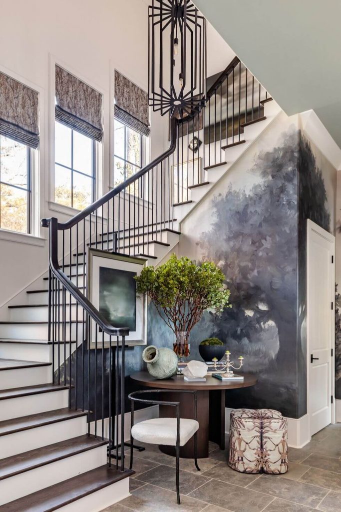 Designer Andre Hilton of Jordan Hilton Interiors introduces the trend of unexpected murals in spaces such as foyers and stair halls