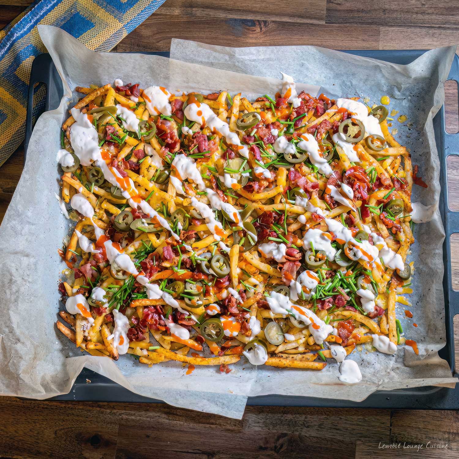 Dirty Fries with Jalapenos and Bacon with garlic and sriracha sauce