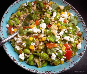 Edamame salad with rice and feta. Healthy plant-based proteins