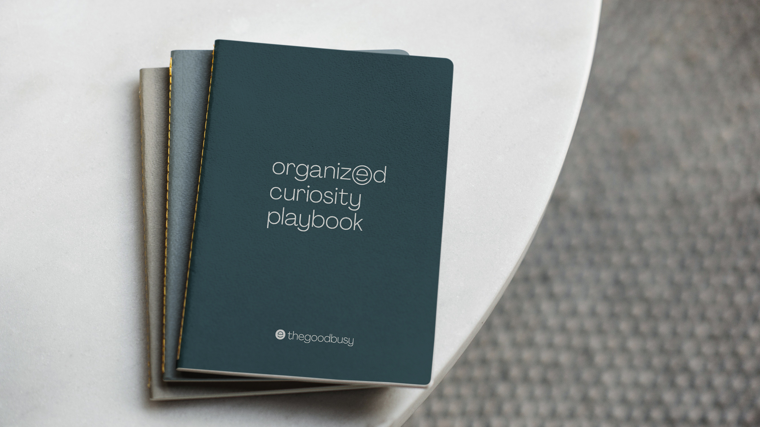 Playbook design for the Good Busy Company. Notebooks used during the workshops