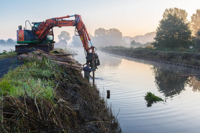 Dike reinforcement works at the canal of Stekene, Belgium