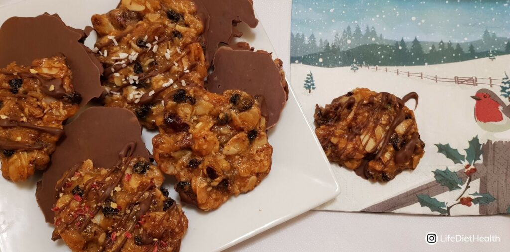 Plate of florentines with one on a seasonal winter serviette