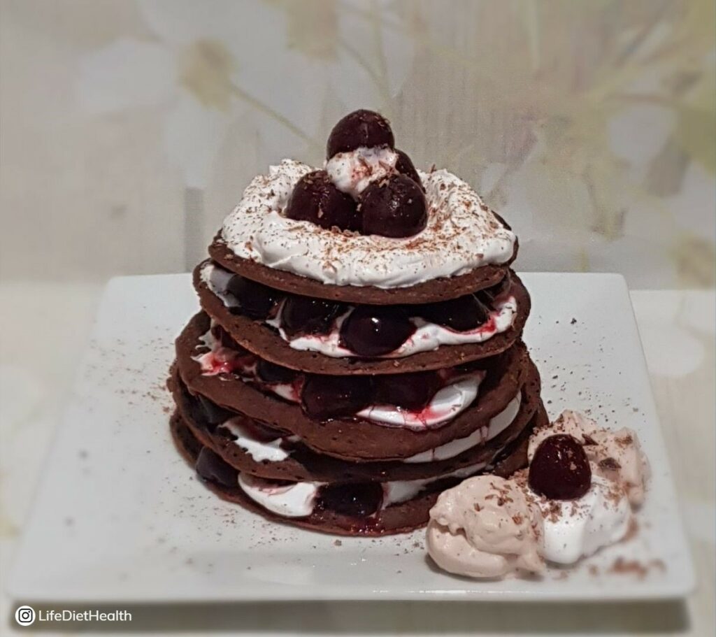 plate of pancakes with chocolate cream