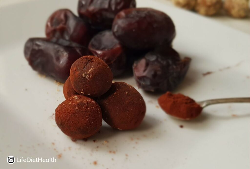 cocoa dusted energy balls with dates