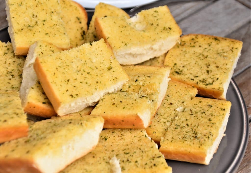 plate of garlic bread slices
