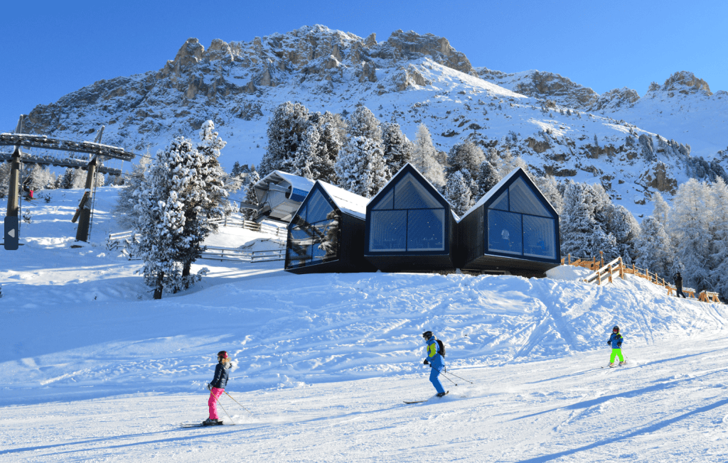 3 people skiing by