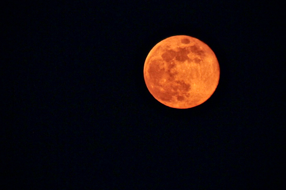 Full moon against the dark sky