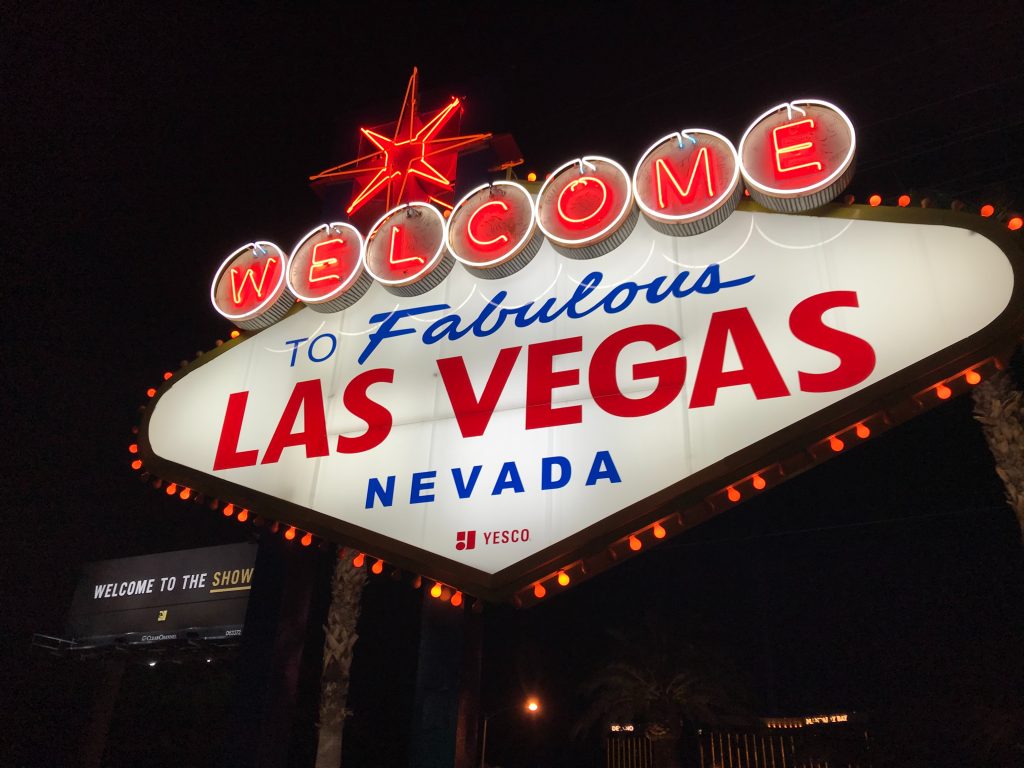 Welcome to Las Vegas Nevada-sign at night. Photo by Guido Coppa on Unsplash used to illustrate an end-of-the-world mood.