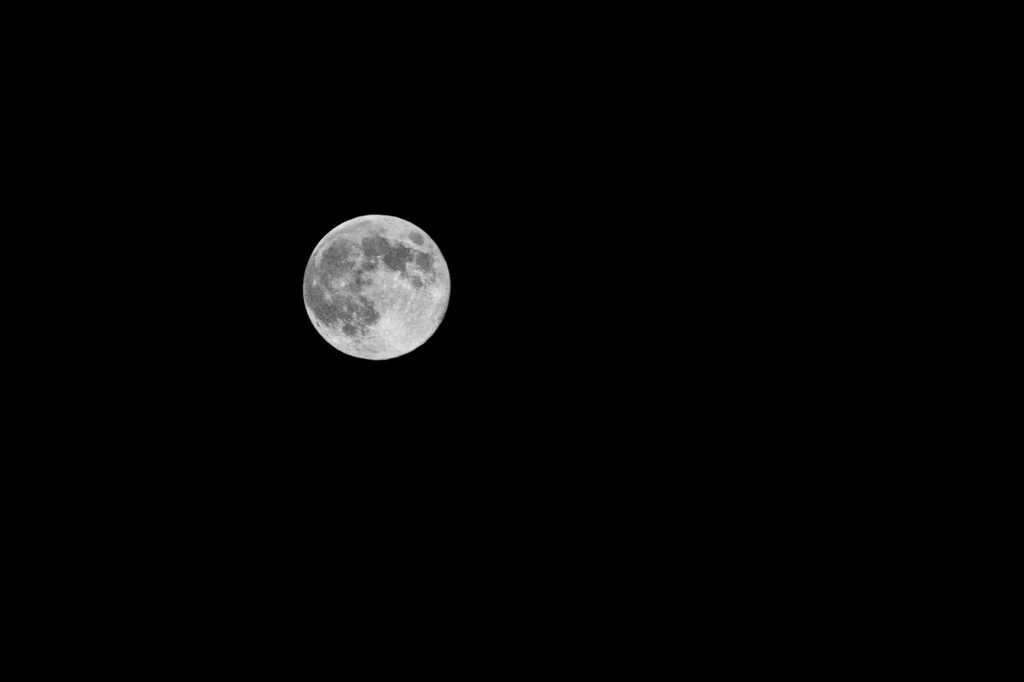 Black and white photo of the moon by Mihaela Limberea