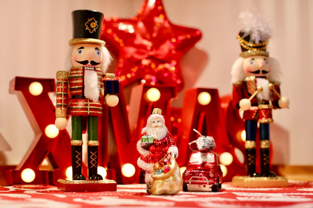 Close up of Christmas decorations, Nutcracker guards and Santa. Photo by Mihaela Limberea