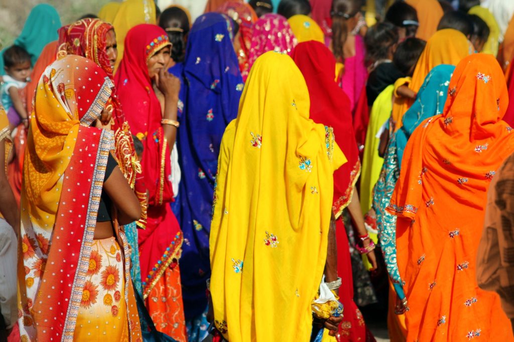 Indian women wearing colorful saris