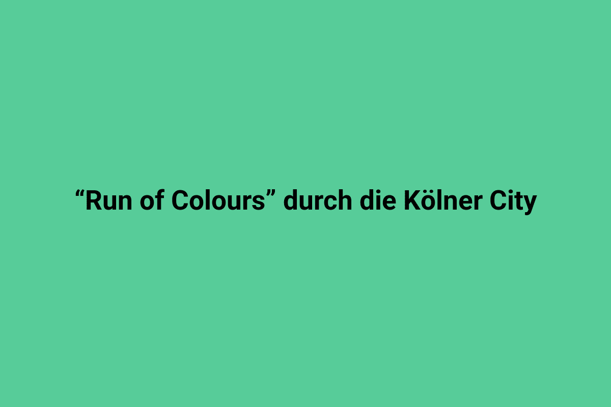 Bunte Laufstrecke durch die Kölner City mit Läufern bei einem Stadtlauf.