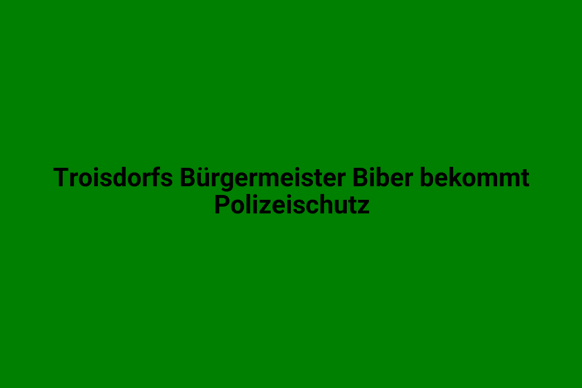Polizeischutz für Troisdorfs Bürgermeister Biber vor Ort.