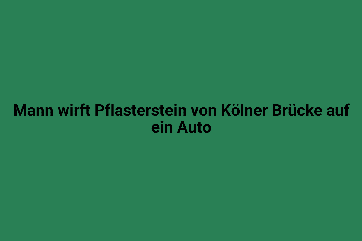 Man wirft Pflasterstein von Kölner Brücke auf ein Auto.