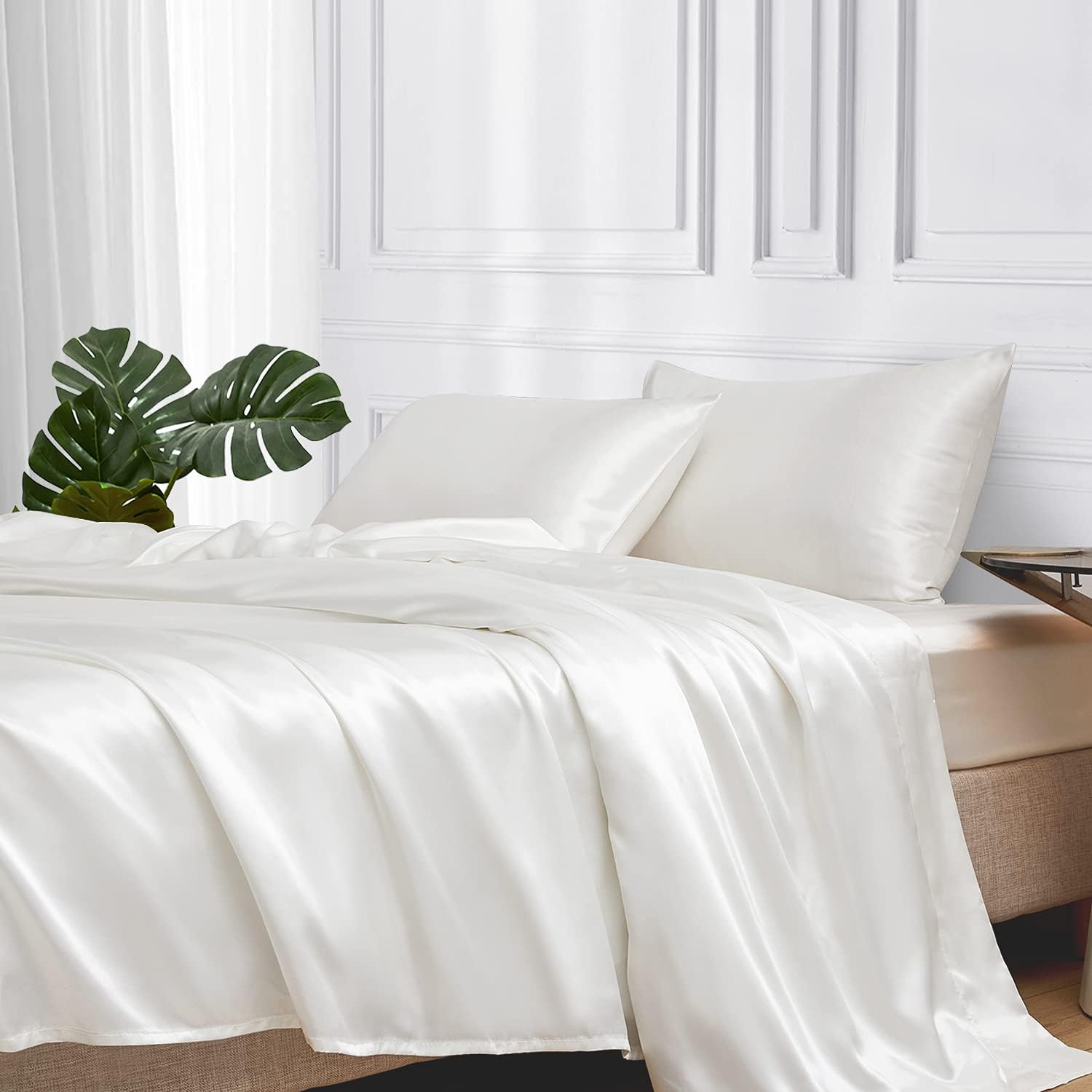 Crisp whites Satin Bed Sheets for a chic look. 