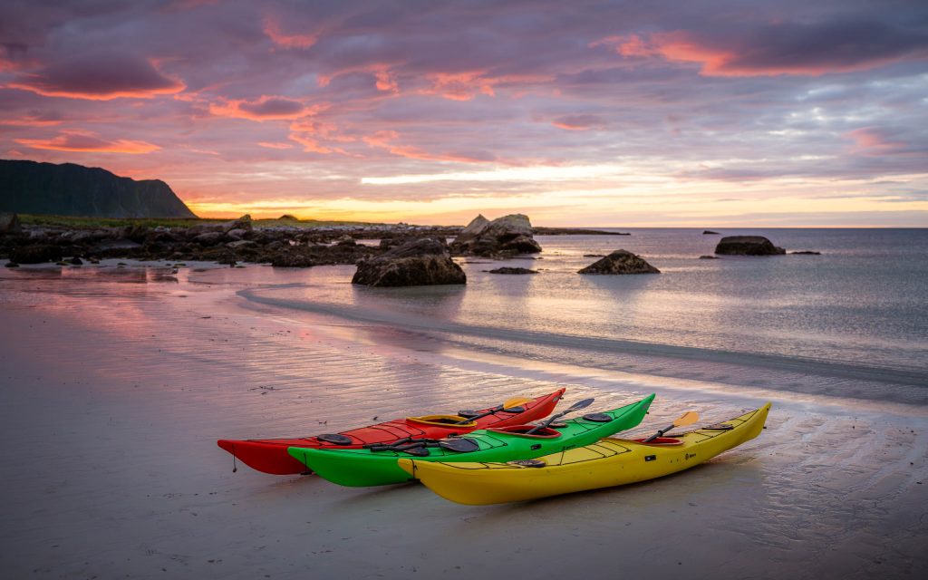 midnight sun kayak tour lofoten islands ramberg flakstad beach