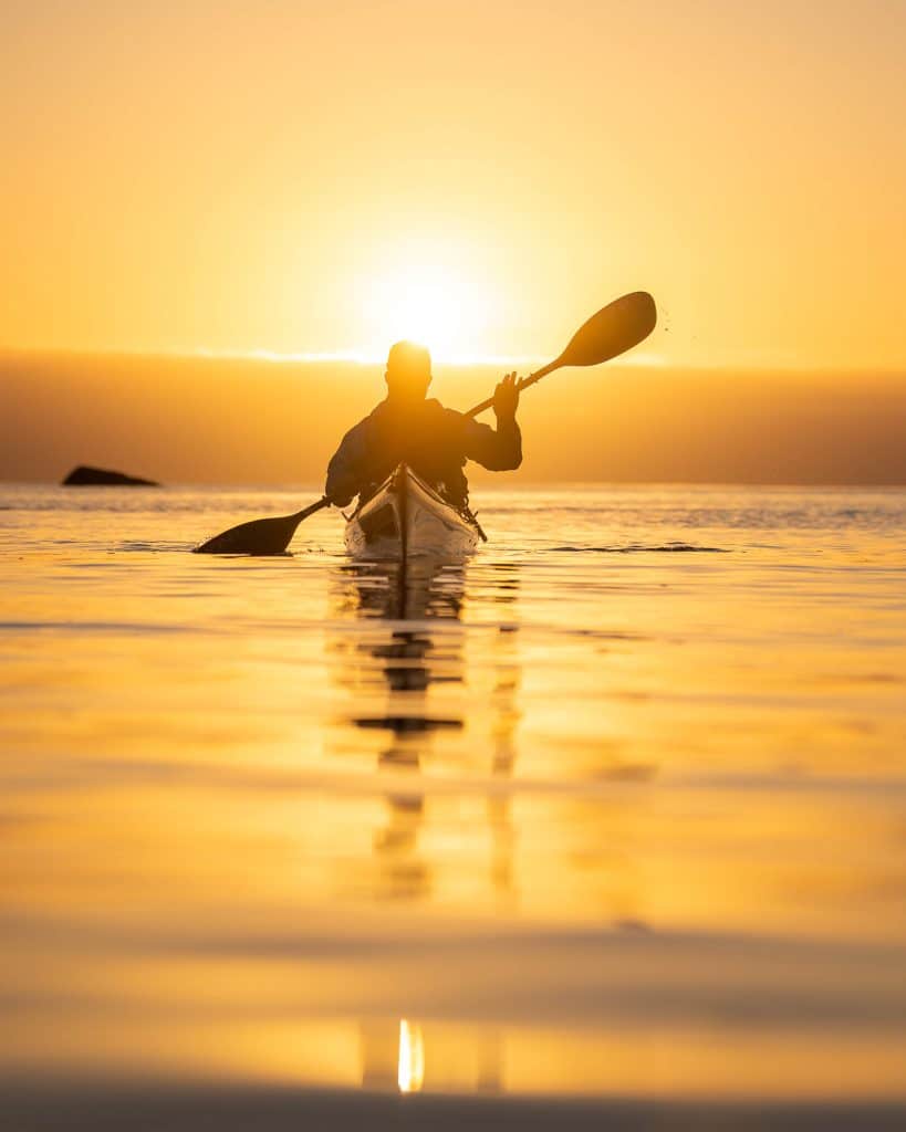 Ramberg Sea Kayaking Guide – Midnight Sun Wilderness Tour white sand beach.jpg Guided Ramberg sea kayaking along white-sand beaches, Arctic open ocean, and pristine wilderness, midnight sun.