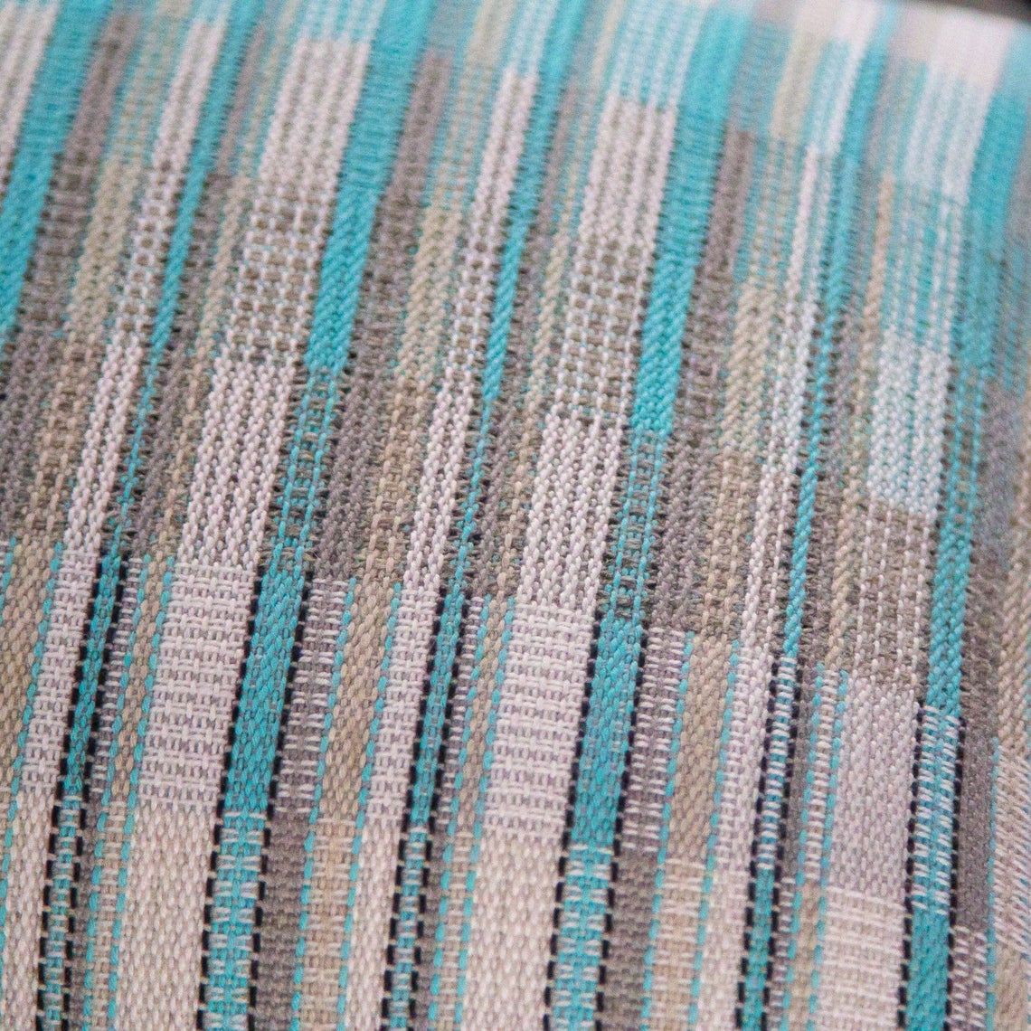 Blue white and silver striped cushion