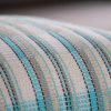 Blue white and silver striped cushion