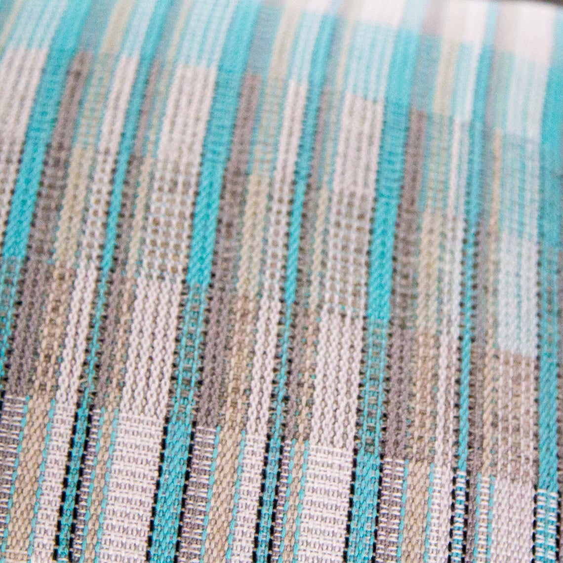 Blue white and silver striped cushion