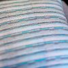 Aquamarine white and silver fleck handwoven cushion