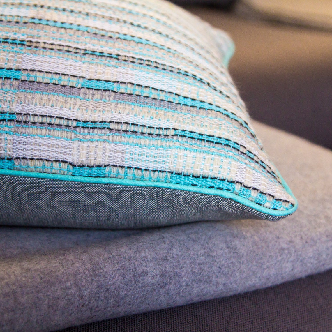 Aquamarine white and silver fleck handwoven cushion