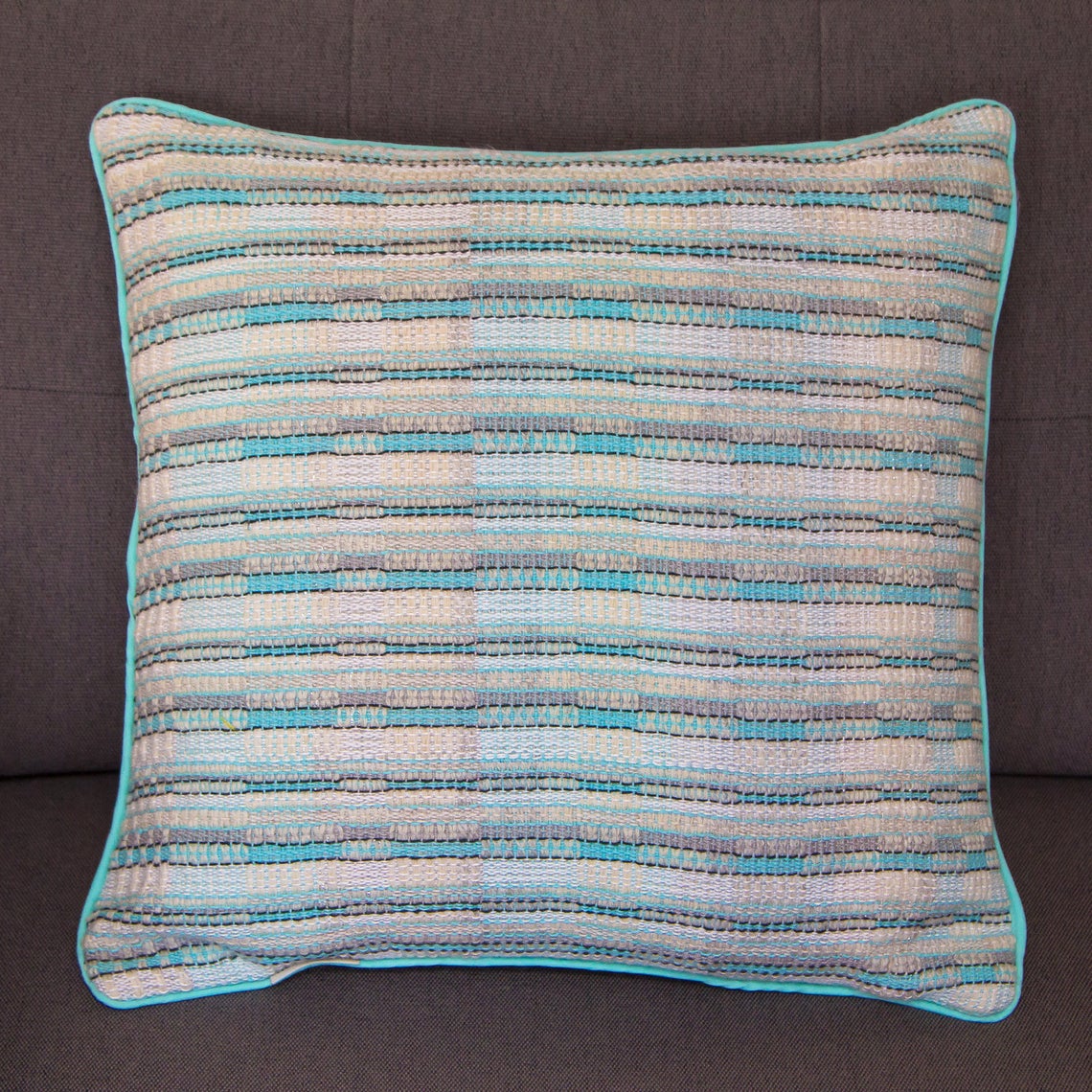 Aquamarine white and silver fleck handwoven cushion