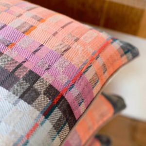 Pastel coloured handwoven cushions