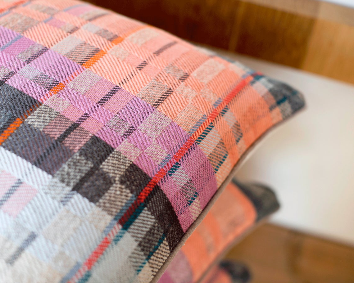 Pastel coloured handwoven cushions