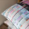 Set of 2 Pastel coloured handwoven cushions with natural pastel colours perfect companion for summer lounge or garden terrace