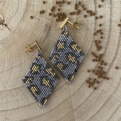 pendiente animal print oro y gris plata