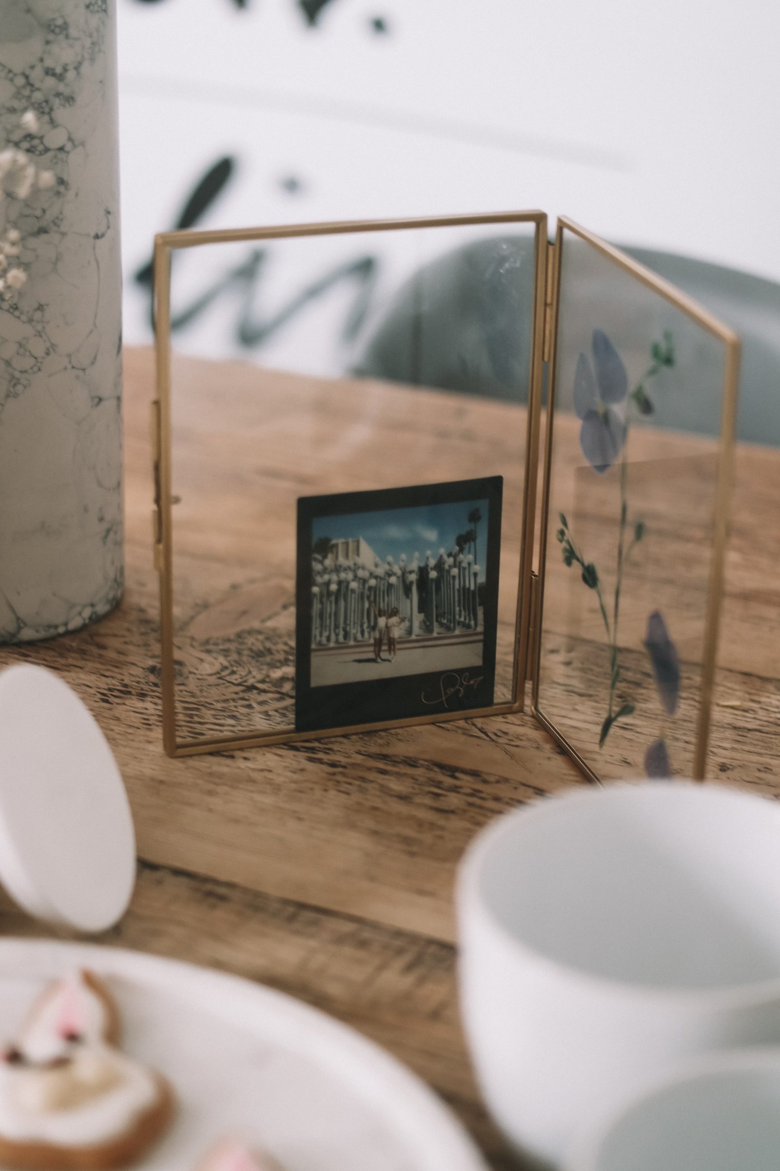 Spring Interiors - Glass & Gold Frame with Pressed Flower in it from Marks & Spencers