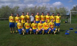 Nicholson (4th from the left) poses for the first team photo