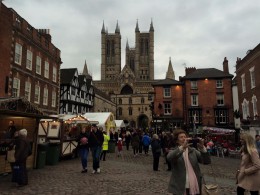 People gathering in the Castle Square to enjoy to festivities of the market.
