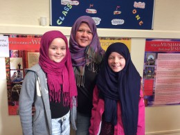 Lucy, Vicky and Katelyn Henderson trying out the hijabs at the mosque open day in Lincoln.