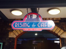 The Rising Cafe sign