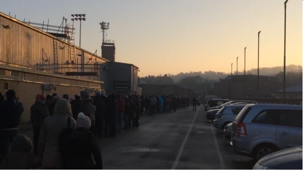 Fans queuing outside Sincil Bank this morning