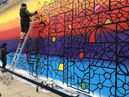 Lincoln Mural being completed in High Street