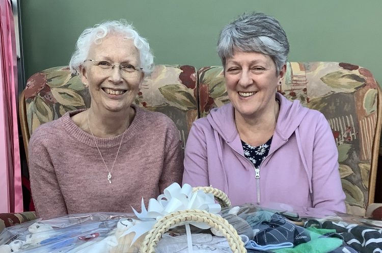Co-founder Anne Jones and regular volunteer Sally Graves spent the
afternoon building a new baby basket